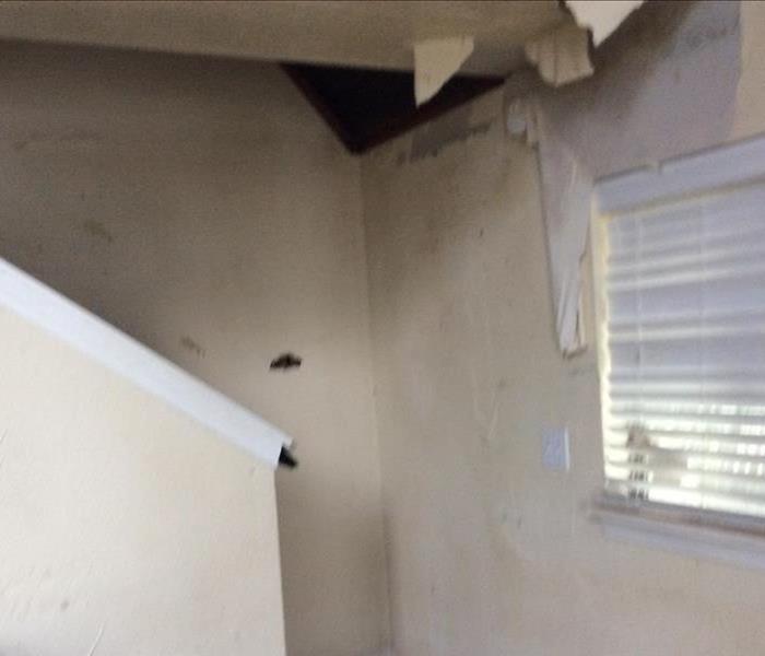 hole in ceiling by staircase